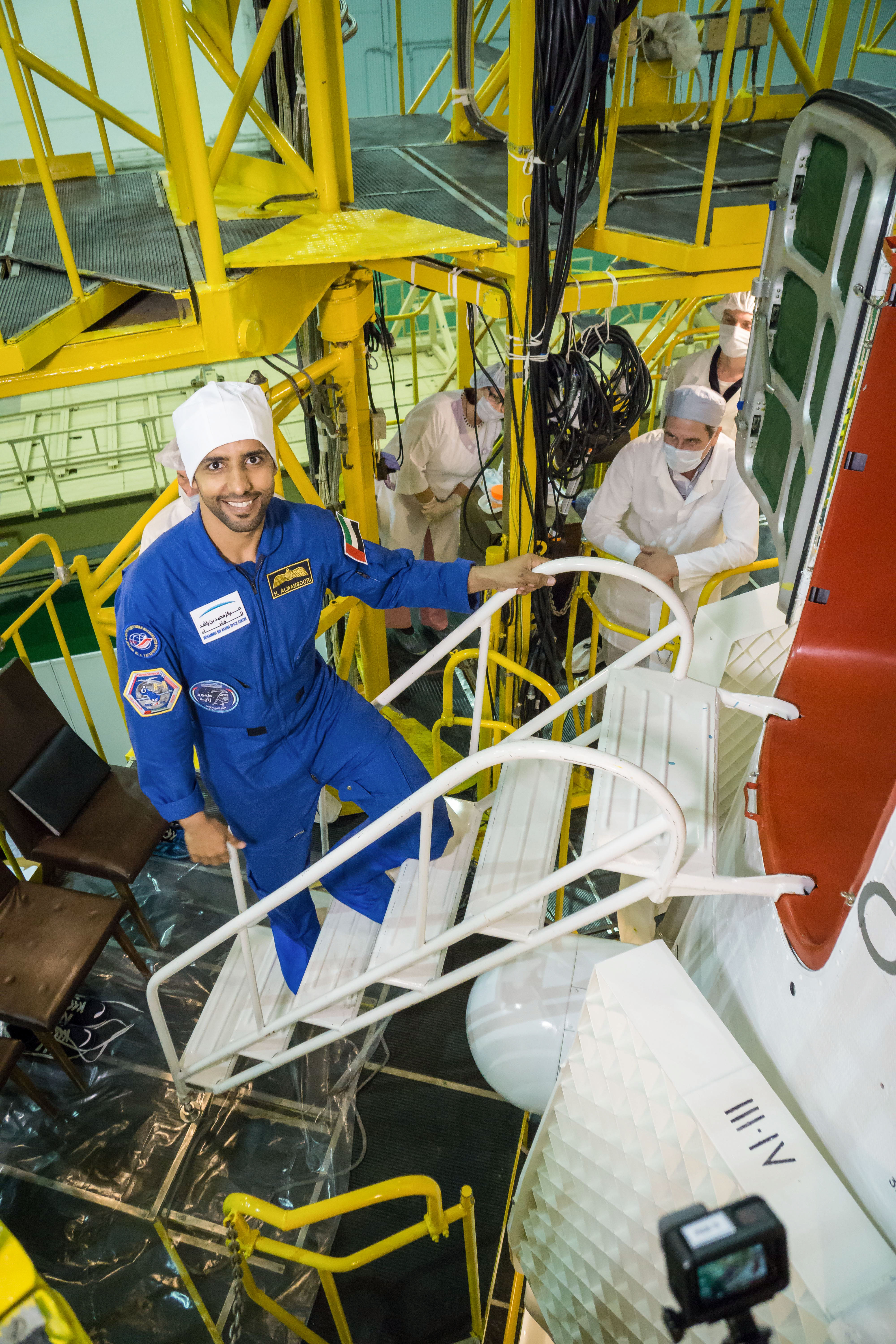 At the Baikonur Cosmodrome in Kazakhstan, spaceflight participant Hazzaa Ali Almansoori of the United Arab Emirates poses for pictures Sept. 20 before inspecting the Soyuz MS-15 spacecraft during final fit check activities. Almansoori and Expedition 61 crewmembers Oleg Skripochka of Roscosmos and Jessica Meir of NASA will launch Sept. 25 on the Soyuz MS-15 spacecraft for a mission on the International Space Station.