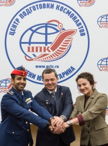 At the Gagarin Cosmonaut Training Center in Star City, Russia, spaceflight participant Hazzaa Ali Almansoori of the United Arab Emirates (left), Oleg Skripochka of Roscosmos (center) and Jessica Meir of NASA (right) pose for pictures Sept. 5 as part of a pre-flight news conference. They will launch Sept. 25 from the Baikonur Cosmodrome in Kazakhstan on the Soyuz MS-15 spacecraft for a mission on the International Space Station.