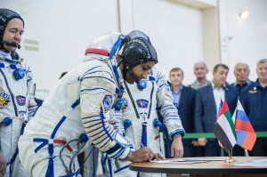 At the Gagarin Cosmonaut Training Center in Star City, Russia, spaceflight participant Hazzaa Ali Almansoori of the United Arab Emirates signs in for the second day of crew qualification exams Aug. 30. Along with Expedition 61 crewmembers Oleg Skripochka of Roscosmos and Jessica Meir of NASA, Almansoori will launch Sept. 25 on the Soyuz MS-15 spacecraft from the Baikonur Cosmodrome in Kazakhstan for a mission on the International Space Station.