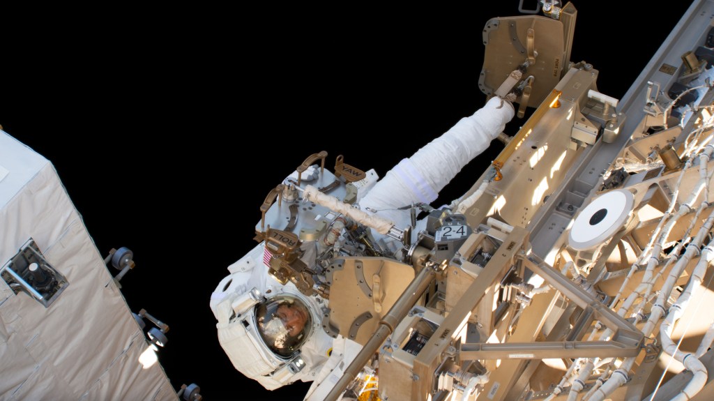 NASA astronaut Christina Koch participates in her first spacewalk to upgrade the International Space Station's power storage capacity. She and fellow spacewalker Nick Hague (out of frame) of NASA worked outside in the vacuum of space for six hours and 45 minutes to continue swapping batteries and install adapter plates on the station's Port-4 truss structure.