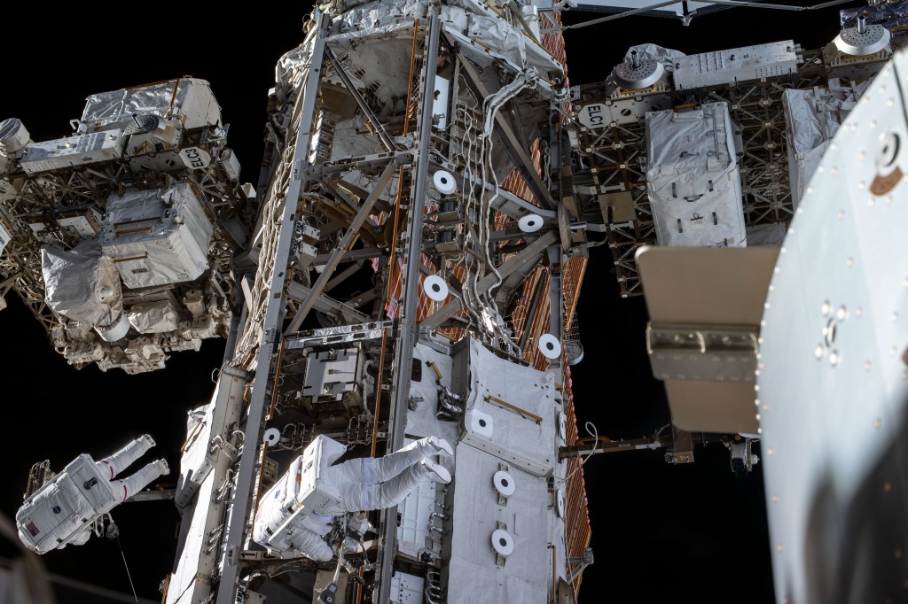 Spacewalkers Andrew Morgan and Luca Parmitano work on get-ahead tasks after completing thermal repairs on the Alpha Magnetic Spectrometer, a dark matter and antimatter detector.
