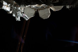 Expedition 59 Flight Engineers Anne McClain of NASA (red stripes) and David Saint-Jacques of the Canadian Space Agency are seen while working outside the International Space Station. In a six and a half hour spacewalk, McClain and Saint-Jacques successfully established a redundant path of power to the Canadian-built robotic arm, known as Canadarm2, and installed cables to provide for more expansive wireless communications coverage outside the orbital complex, as well as for enhanced hardwired computer network capability. The duo also relocated an adapter plate from the first spacewalk in preparation for future battery upgrade operations.