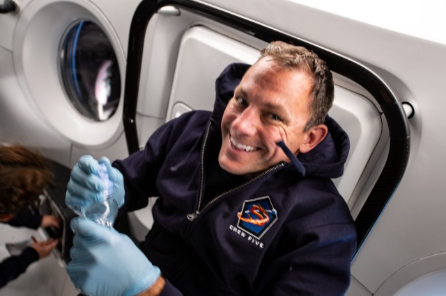 iss068e012324 (Oct. 6, 2022) --- SpaceX Crew-5 Pilot Josh Cassada of NASA is pictured aboard the Dragon Endurance crew ship during a flight to the International Space Station.