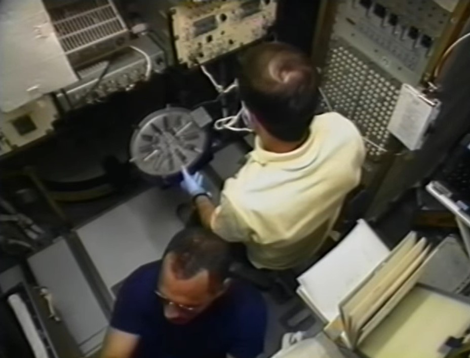 Kenneth S. Reightler processes blood samples in the centrifuge