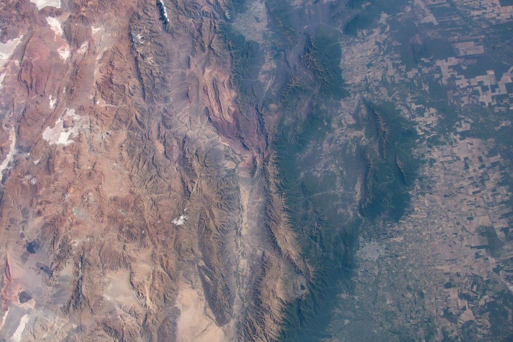 The Andes mountain range that separates the arid and sub-tropical climates in northern Argentina is pictured as the International Space Station orbits from an altitude of 260 miles.