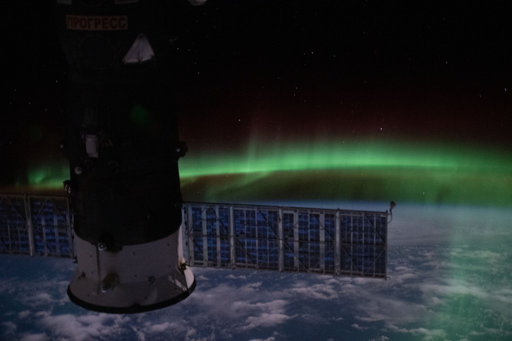This orbital nighttime view from the International Space Station as it orbited above the Indian Ocean shows the "aurora australis" and a starry sky with Russia's Progress 74 resupply ship in the foreground.