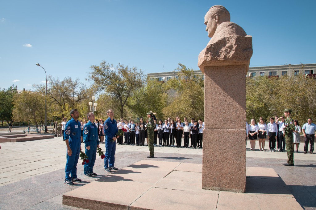 In the town of Baikonur, Kazakhstan, the backup crewmembers for the next launch to the International Space Station pay tribute Sept. 12 at a statue of Sergei Korolev, the Russian great designer, as part of traditional pre-launch activities. Backup spaceflight participant Sultan Al-Neyadi of the United Arab Emirates (left), Sergey Ryzhikov of Roscosmos (center) and Tom Marshburn of NASA (right) are the backups to the prime Expedition 61 crew, Oleg Skripochka of Roscosmos and Jessica Meir of NASA and spaceflight participant Hazzaa Ali Almansoori of the United Arab Emirates, who will launch Sept. 25 on the Soyuz MS-15 spacecraft for a mission on the International Space Station.