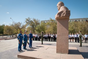 In the town of Baikonur, Kazakhstan, the backup crewmembers for the next launch to the International Space Station pay tribute Sept. 12 at a statue of Sergei Korolev, the Russian great designer, as part of traditional pre-launch activities. Backup spaceflight participant Sultan Al-Neyadi of the United Arab Emirates (left), Sergey Ryzhikov of Roscosmos (center) and Tom Marshburn of NASA (right) are the backups to the prime Expedition 61 crew, Oleg Skripochka of Roscosmos and Jessica Meir of NASA and spaceflight participant Hazzaa Ali Almansoori of the United Arab Emirates, who will launch Sept. 25 on the Soyuz MS-15 spacecraft for a mission on the International Space Station.