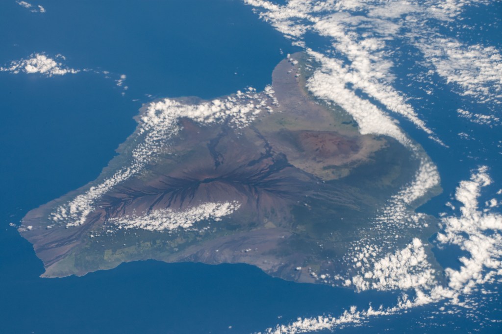 The big island of Hawaii and its two prominent mountains Mauna Loa, an active volcano, and Mauna Kea, a dormant volcano, were pictured as the International Space Station orbited about 315 miles southeast above the Pacific Ocean.