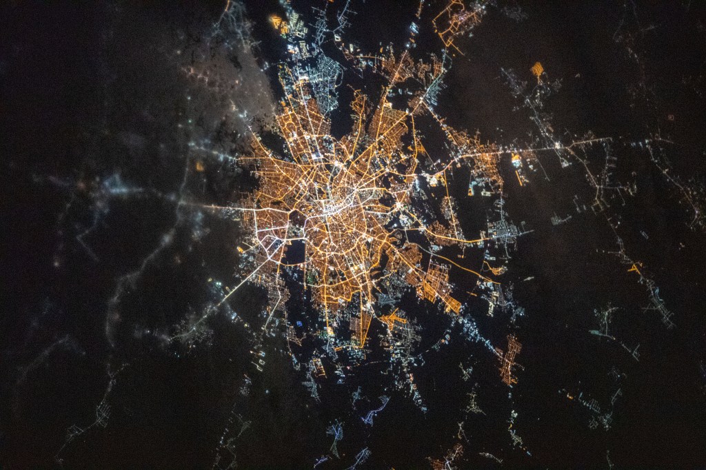 The brightly lit capital city of Bucharest, Romania with a population of almost 1.9 million, is pictured from the International Space Station as it orbited 263 miles above the eastern European nation.