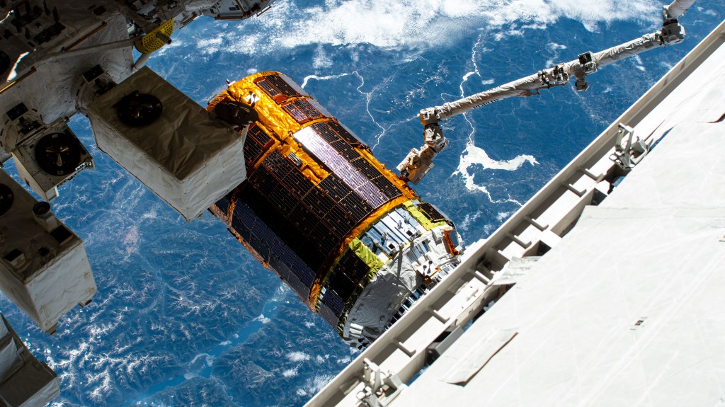The Canadarm2 robotic arm maneuvers JAXA's (Japan Aerospace Exploration Agency) H-II Transfer Vehicle-9 (HTV-9) into release position after uninstalling it from the Harmony module. The HTV-9 resupply ship arrived at the International Space Station on May 25 delivering four tons of food, fuel, crew supplies and station experiments to the Expedition 63 crew.