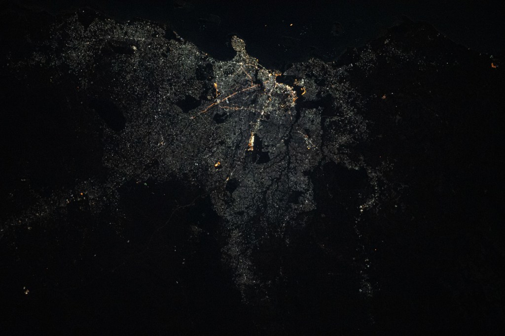 The city of Dar Es Salaam, a major commercial port on the Indian Ocean coast of Tanzania, is pictured during an orbital night period as the International Space Station soared above the eastern coast of Africa.