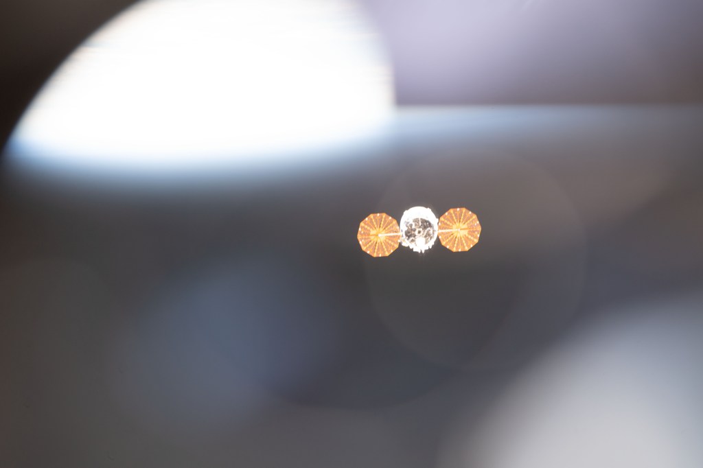 The Cygnus space freighter from Northrop Grumman begins its separation from the International Space Station following its release from the Canadarm2 robotic arm.