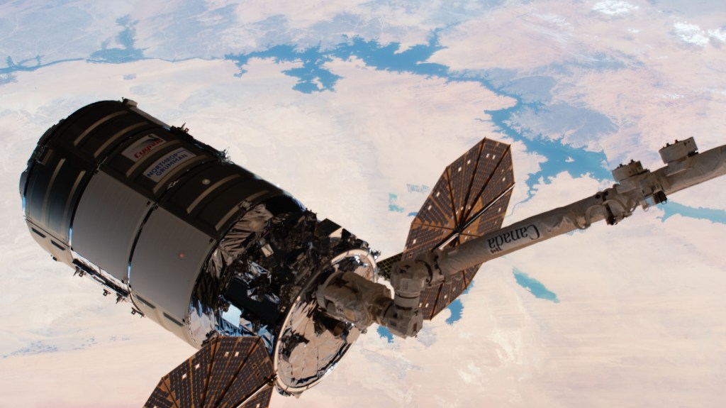 The Northrop Grumman Cygnus space freighter is pictured after being captured by the Canadarm2 robotic arm as the International Space Station orbited above Egypt.