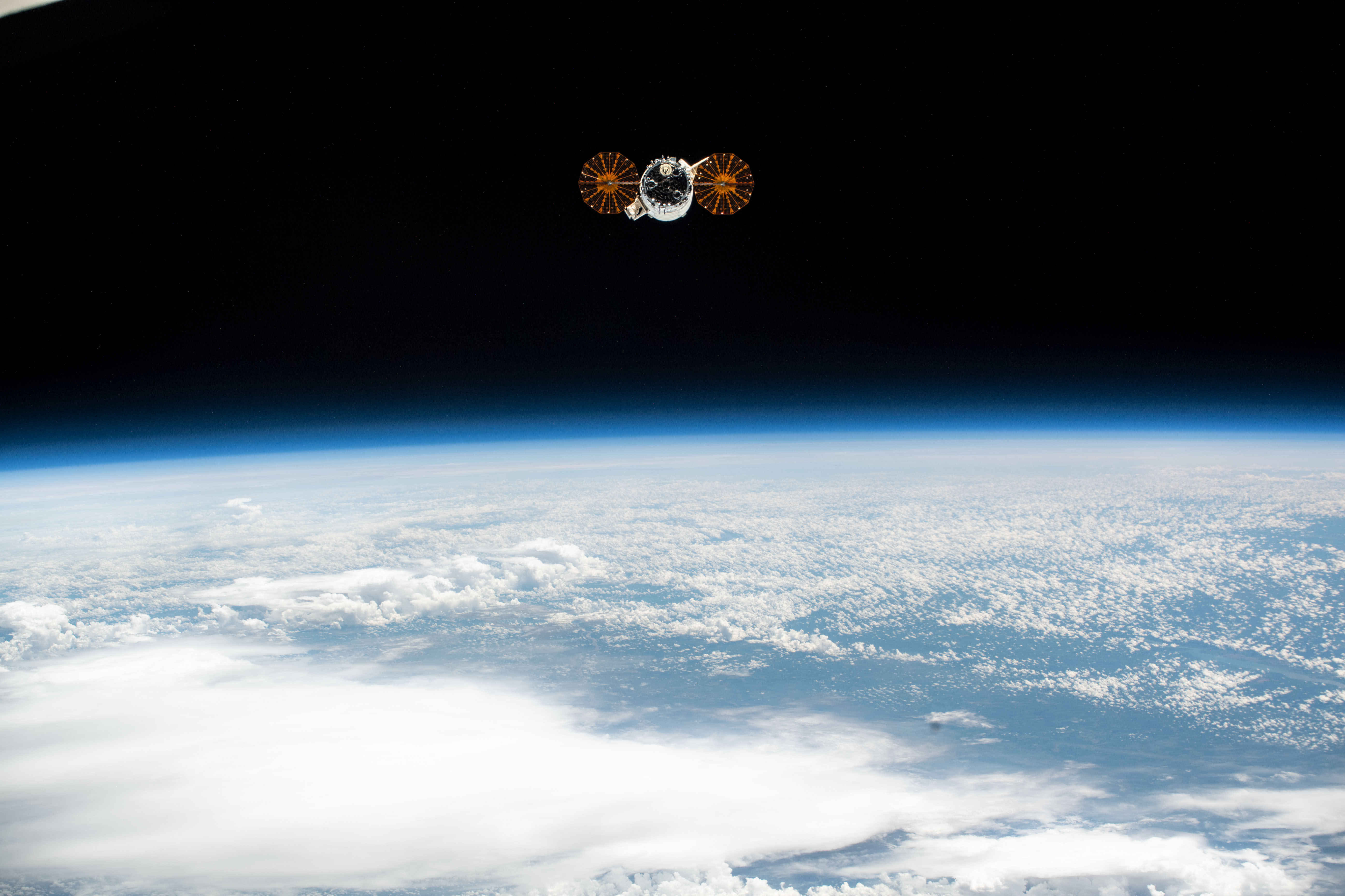 The Cygnus space freighter from Northrop Grumman is pictured departing the vicinity of the International Space Station after its release from the Canadarm2 robotic arm. Cygnus had completed an 88-day stay attached to the Unity module after delivering nearly 8,200 pounds of research and supplies to space station on Nov. 4, 2019.