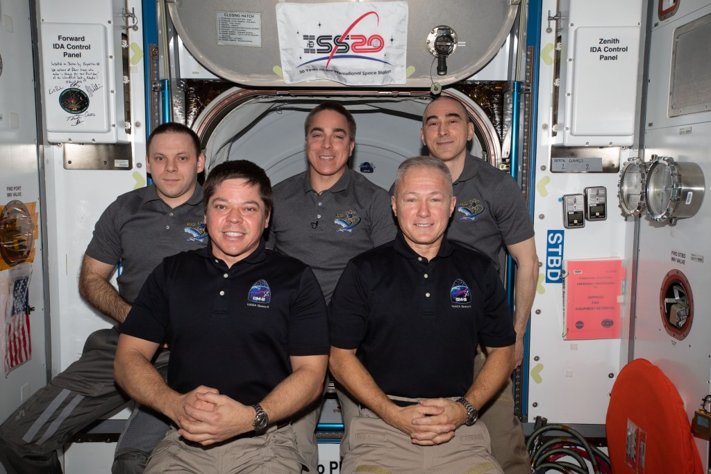 The Expedition 63 crew gathers for a final portrait before the departure of NASA's commercial crew astronauts (front row, from left) Bob Behnken and Doug Hurley. In the center back row, is NASA Commander Chris Cassidy flanked by Roscosmos Flight Engineers (from left) Ivan Vagner and Anatoly Ivanishin.