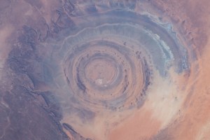 From an altitude of 255 miles, an Expedition 59 crewmember photographed the Richat Structure, or the "Eye of the Sahara," in northwestern Mauritania. The circular geologic feature is thought to be caused by an uplifted dome—geologists would classify it as a domed anticline—that has been eroded to expose the originally flat rock layers.