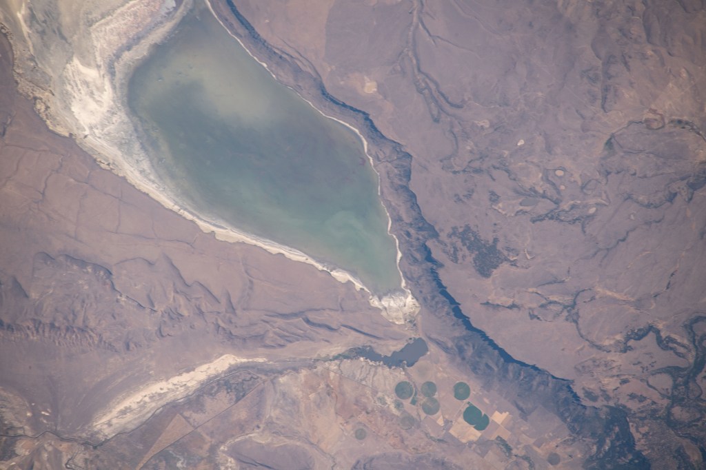 The high-saline Lake Abert, surrounded by arid land in Oregon, is pictured from the International Space Station as it orbited above the western United States.