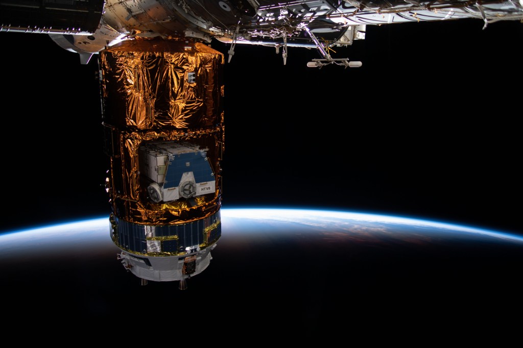 The International Space Station soars into an orbital sunrise above the Pacific Ocean northeast of Australia. Japan's H-II Transfer Vehicle-9 (HTV-9) figures prominently in this photograph. Inside the HTV-9 is the HTV-8 pallet carrying old nickel-hydrogen batteries removed from the station during previous spacewalks.