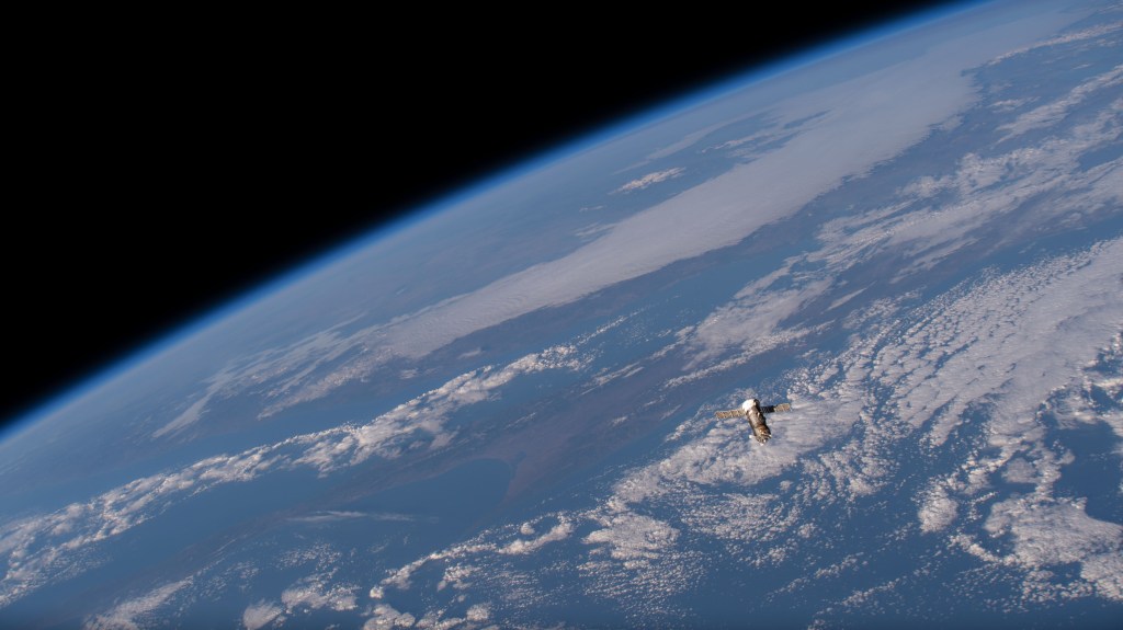 iss068e018242 (Oct. 23, 2022) --- The uncrewed ISS Progress 80 cargo craft is pictured departing the vicinity of the International Space Station after undocking from the orbiting lab's Poisk module. The trash-filled Progress 80 would reenter the Earth's atmosphere above the Pacific Ocean a few hours later for a fiery, but safe demise.