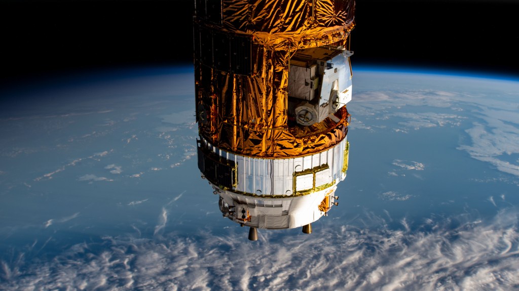 The Kounotori H-II Transfer Vehicle 8 (HTV-8) from the Japan Aerospace Exploration Agency is pictured attached to the International Space Station's Harmony module (out of frame).
