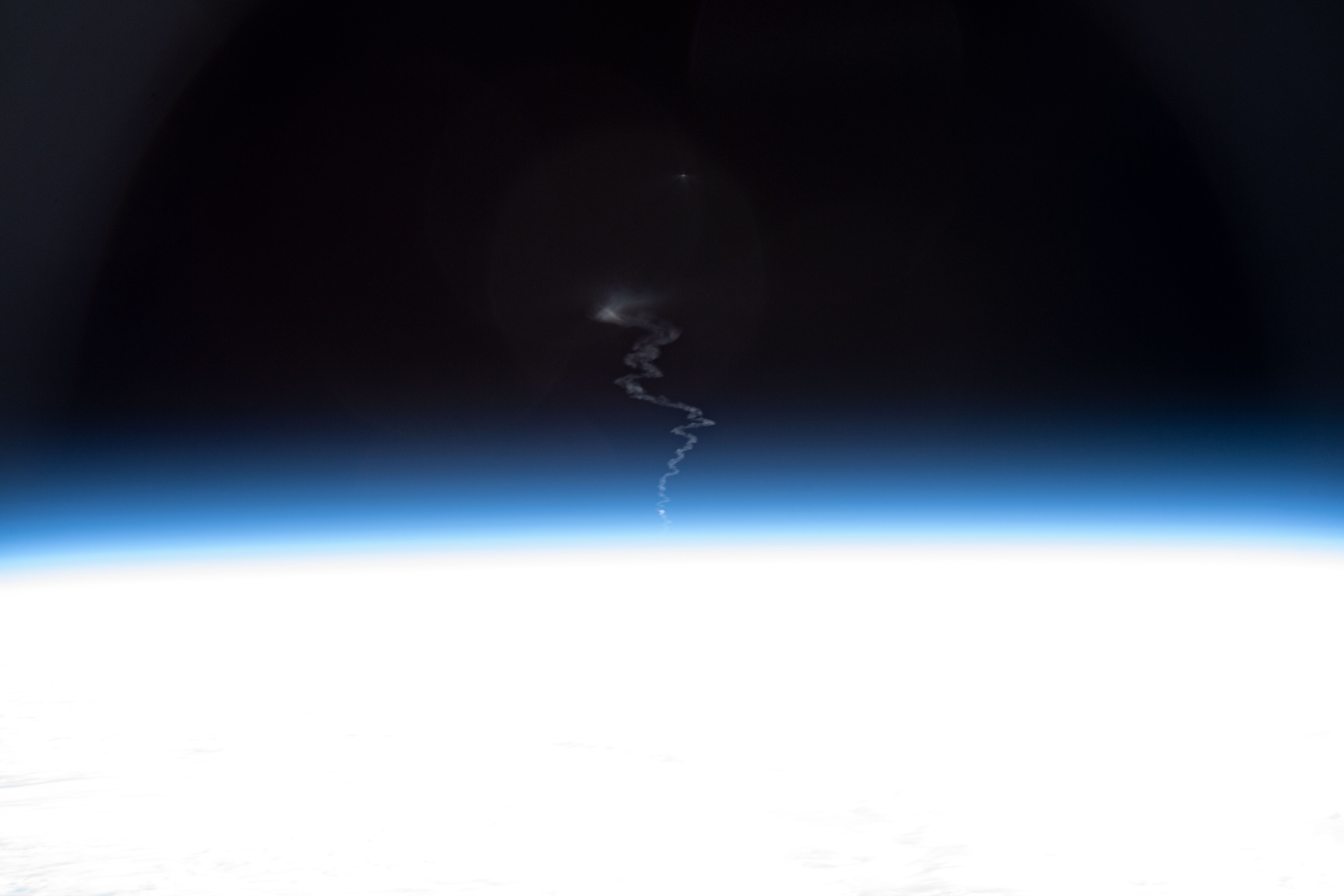 The launch plume of Russia's Progress 76 (76P) resupply ship, after it blasted off from the Baikonur Cosmodrome in Kazakhstan, is pictured from the International Space Station. The 76P was packed with nearly three tons of food, fuel and supplies, and would dock to the station's Pirs docking compartment less than three-and-a-half hours later.