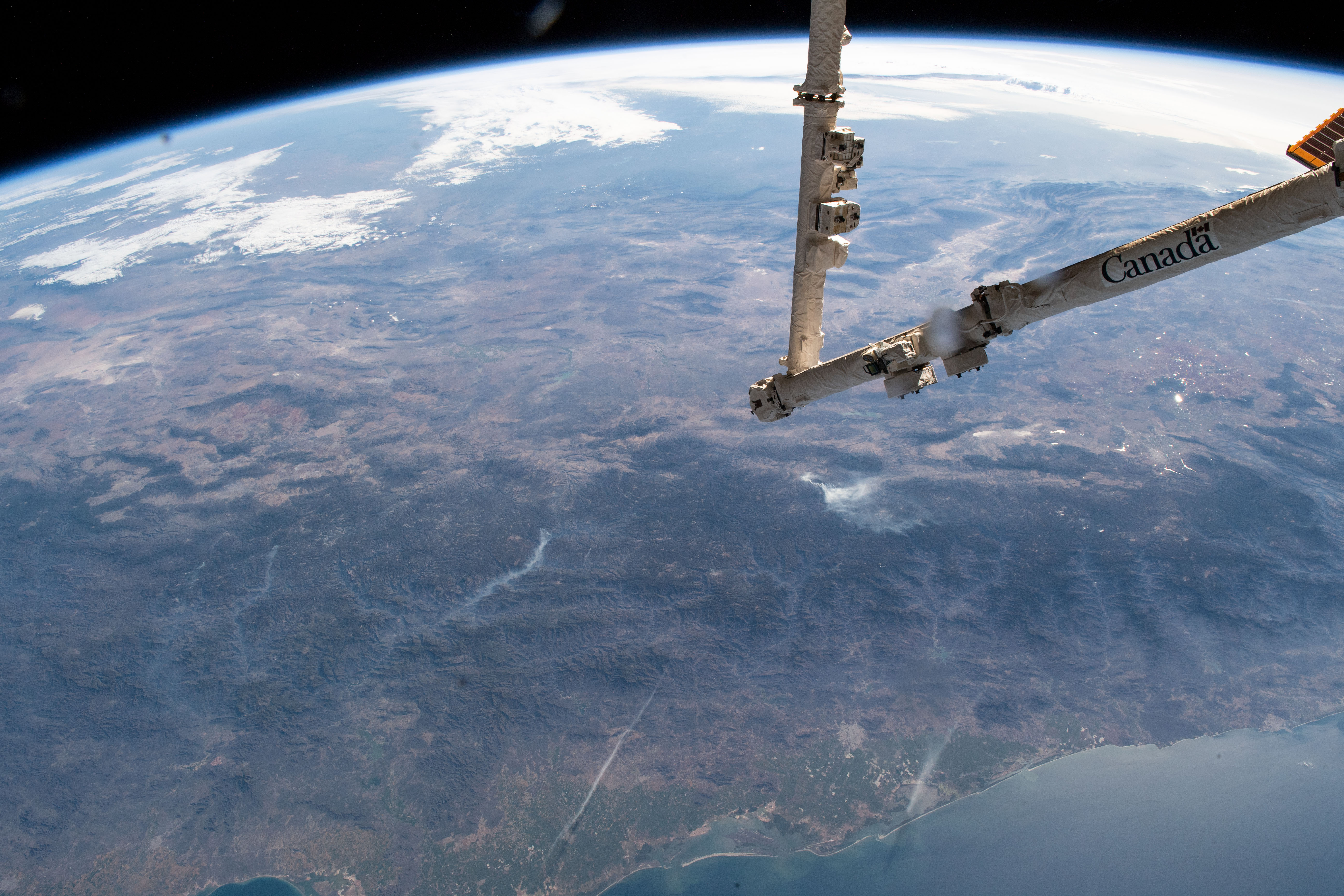 The Mexican state of Sinaloa and its central coast on the Gulf of California are pictured as the International Space Station orbited 255 miles above the Pacific Ocean. The station's Canadarm2 robotic arm is extended in the foreground the day before it would capture and install Northrop Grumman's Cygnus resupply ship to the Unity module.