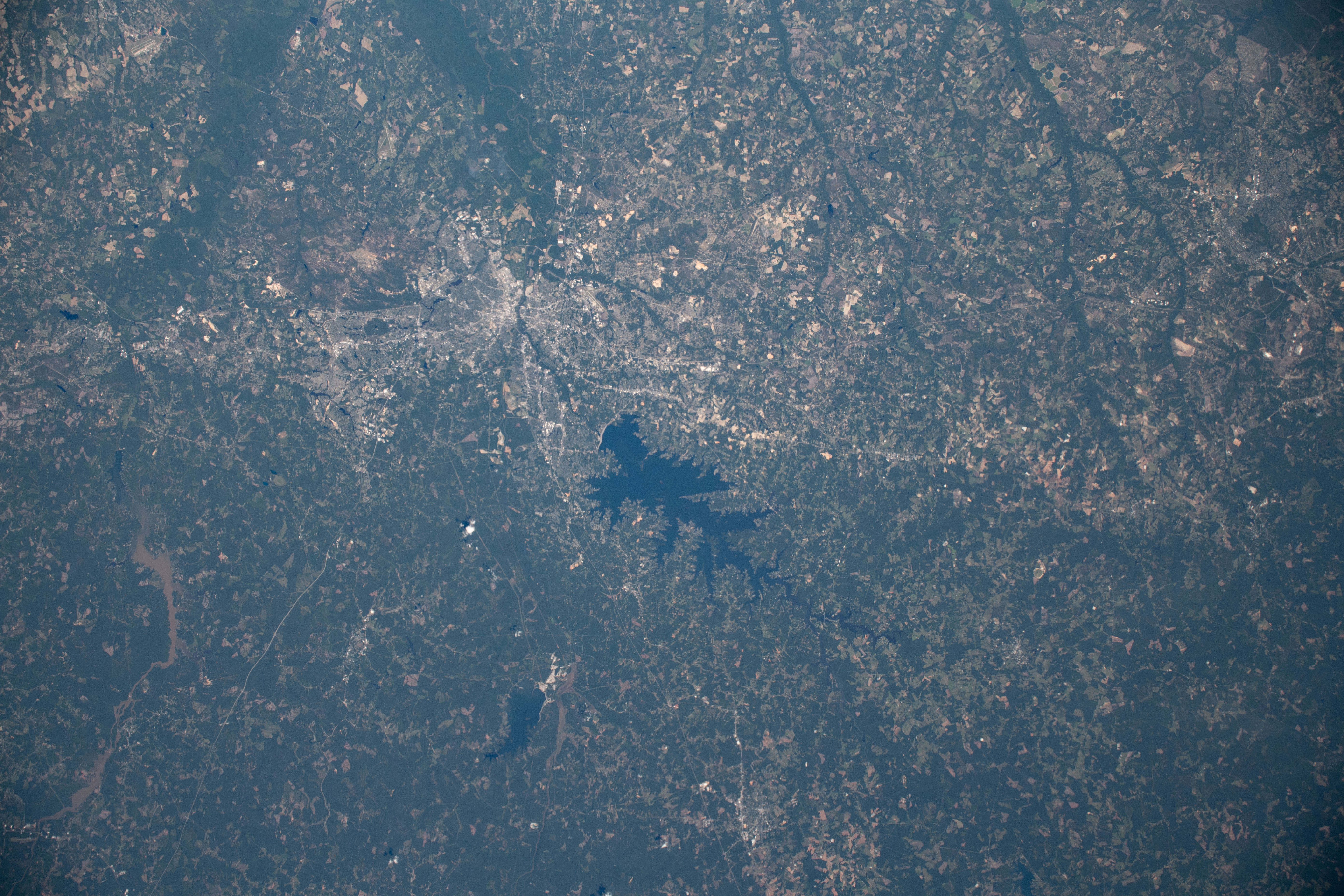 The Monticello Reservoir, Lake Murray and Columbia, South Carolina are pictured as the International Space Station orbited above the Atlantic Coastal Plain of the United States at an altitude of 256 miles.
