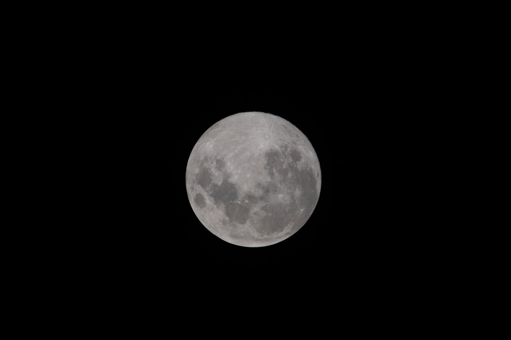 iss068e027781 (Dec. 7, 2022) --- The Moon is pictured the day before its Full Moon phase from the International Space Station as it orbited 269 miles above the southern Indian Ocean. At the time of this photograph the Orion vehicle on the Artemis I mission was 234,100 miles from Earth and 127,700 miles from the Moon, cruising at 820 miles per hour.