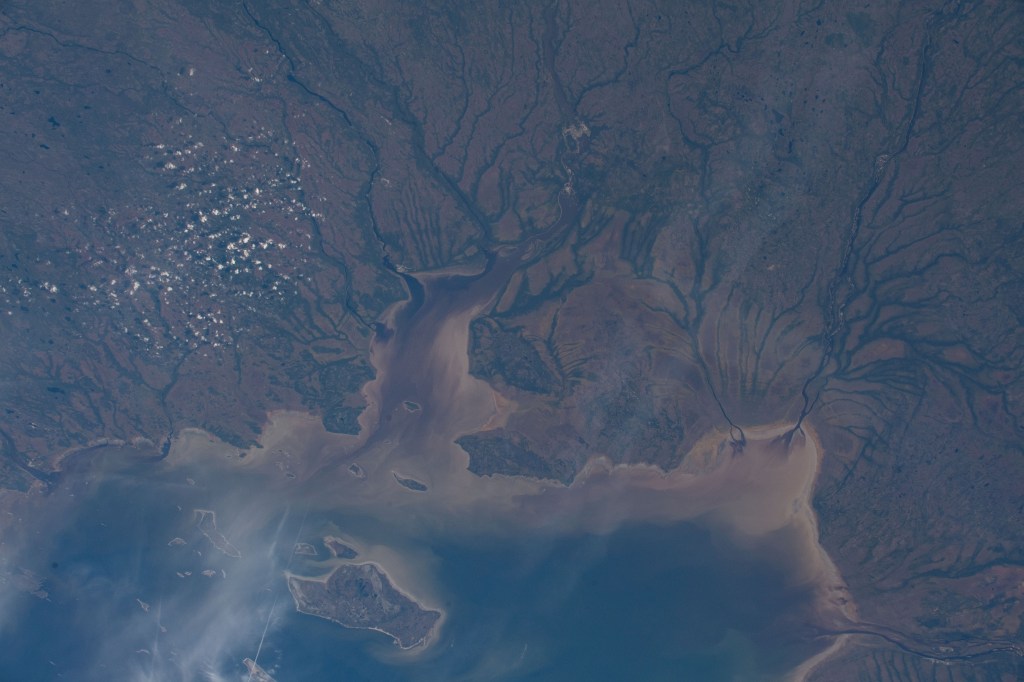 The Nottaway River empties into the southern tip of James Bay in the Canadian province of Quebec. The International Space Station was orbiting 252 miles above North America and 189 miles south of James Bay at the time this photograph was taken.