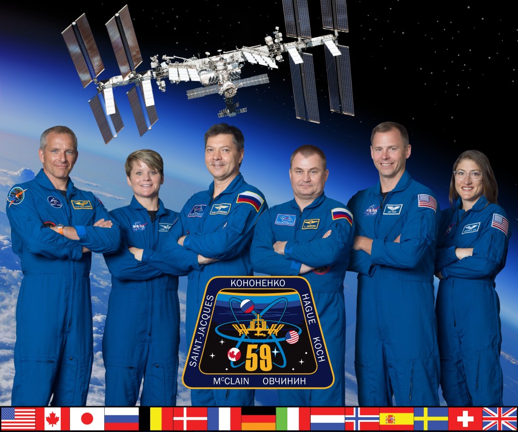 The official Expedition 59 crew portrait with (from left) astronauts David Saint-Jacques of the Canadian Space Agency and Anne McClain of NASA; cosmonauts Oleg Konenenko and Alexey Ovchinin of Roscosmos; and NASA astronauts Nick Hague and Christina Koch.