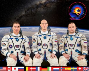 The official Expedition 63 crew portrait. From left are, NASA astronaut and Commander Chris Cassidy and Roscosmos cosmonauts and Flight Engineers Anatoly Ivanishin and Ivan Vagner.