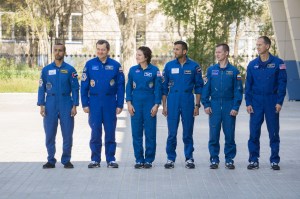 At their Cosmonaut Hotel crew quarters in Baikonur, Kazakhstan, the prime and backup crew members for the next launch to the International Space Station attend flag-raising ceremonies Sept. 12. From left to right are the prime crewmembers, Hazzaa Ali Almansoori of the United Arab Emirates and Expedition 61 crewmembers Oleg Skripochka of Roscosmos and Jessica Meir of NASA and their backups, Sultan Al-Neyadi of the United Arab Emirates, Sergey Ryzhikov of Roscosmos and Tom Marshburn of NASA. Almansoori, Skripochka and Meir will launch Sept. 25 on the Soyuz MS-15 spacecraft for a mission on the International Space Station. Image: NASA/Victor Zelentsov.