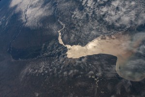 The Rio de la Plata separates the nations of Argentina (bottom) and Uruguay (top) in this photograph from the International Space Station as it orbited 270 miles above. Barely visible (at lower center), is the populous city of Buenos Aires, Argentina, at the mouth of the Paraná Delta which empties in to the Rio de la Plata.