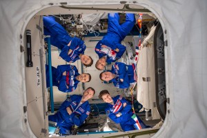 The six-member Expedition 59 crew gathers for a portrait aboard the International Space Station. Clockwise from center left are, Commander Oleg Kononenko and Flight Engineers Christina Koch, David Saint-Jacques, Alexey Ovchinin, Anne McClain and Nick Hague.