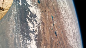 This photograph from the International Space Station looks across the snow-capped Himalayas and into southern China as the orbiting lab flew 262 miles above India.