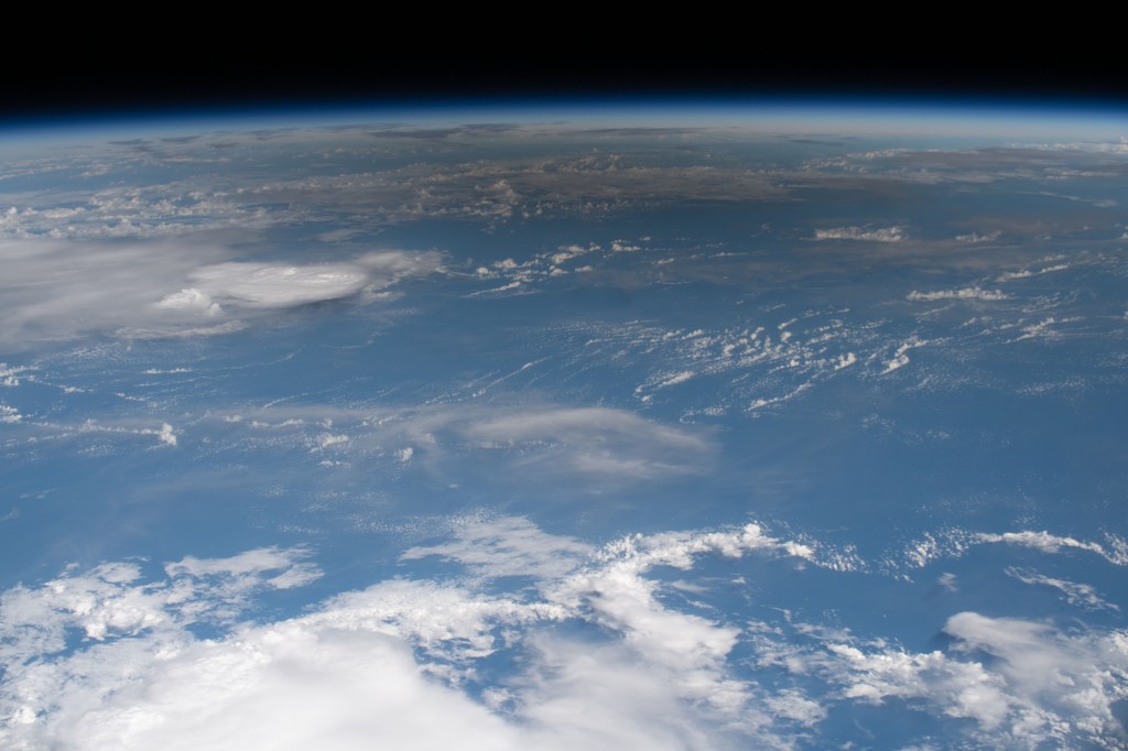 The shadow of the Moon is cast over portions of Malaysia and the Philippines during today's solar eclipse. The International Space Station was orbiting 260 miles above the South China Sea at the time this photograph was taken.