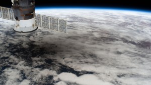 The International Space Station was orbiting above China when this picture of the solar eclipse shadowing a portion of the Asian continent was captured by an external high definition camera. In the left foreground, is the Progress 74 resupply ship from Russia.
