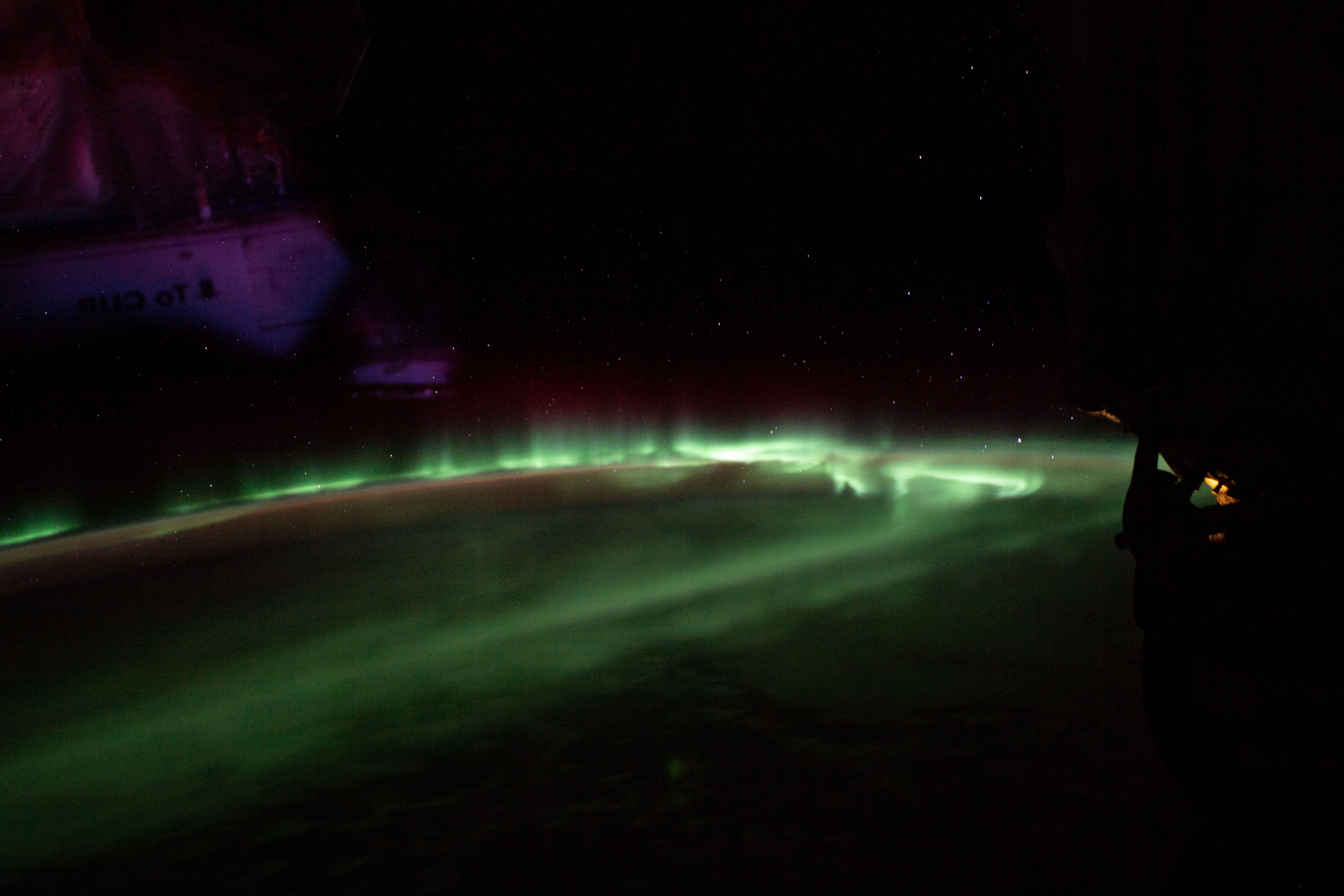 The aurora australis, also known as the "southern lights," is pictured as the International Space Station orbited 264 miles above the Indian Ocean south of the Australian island state of Tasmania.