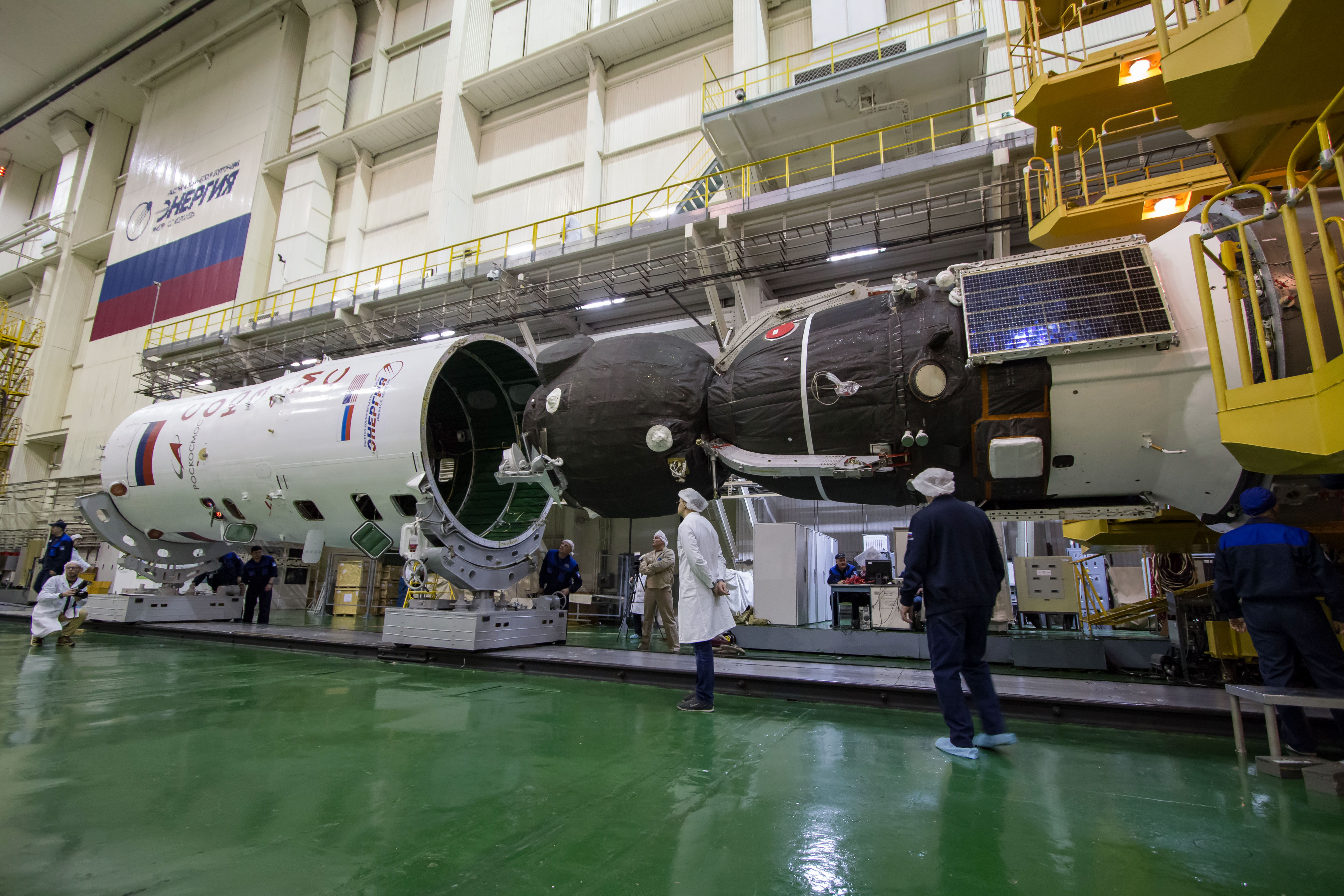 In the Integration Building at the Baikonur Cosmodrome in Kazakhstan, the Soyuz MS-12 spacecraft is encapsulated into the nose fairing of the Soyuz booster rocket March 6. Expedition 59 crew members Nick Hague and Christina Koch of NASA and Alexey Ovchinin of Roscosmos will launch on March 14, U.S. time, on the Soyuz MS-12 spacecraft from the Baikonur Cosmodrome for a six-and-a-half month mission on the International Space Station.