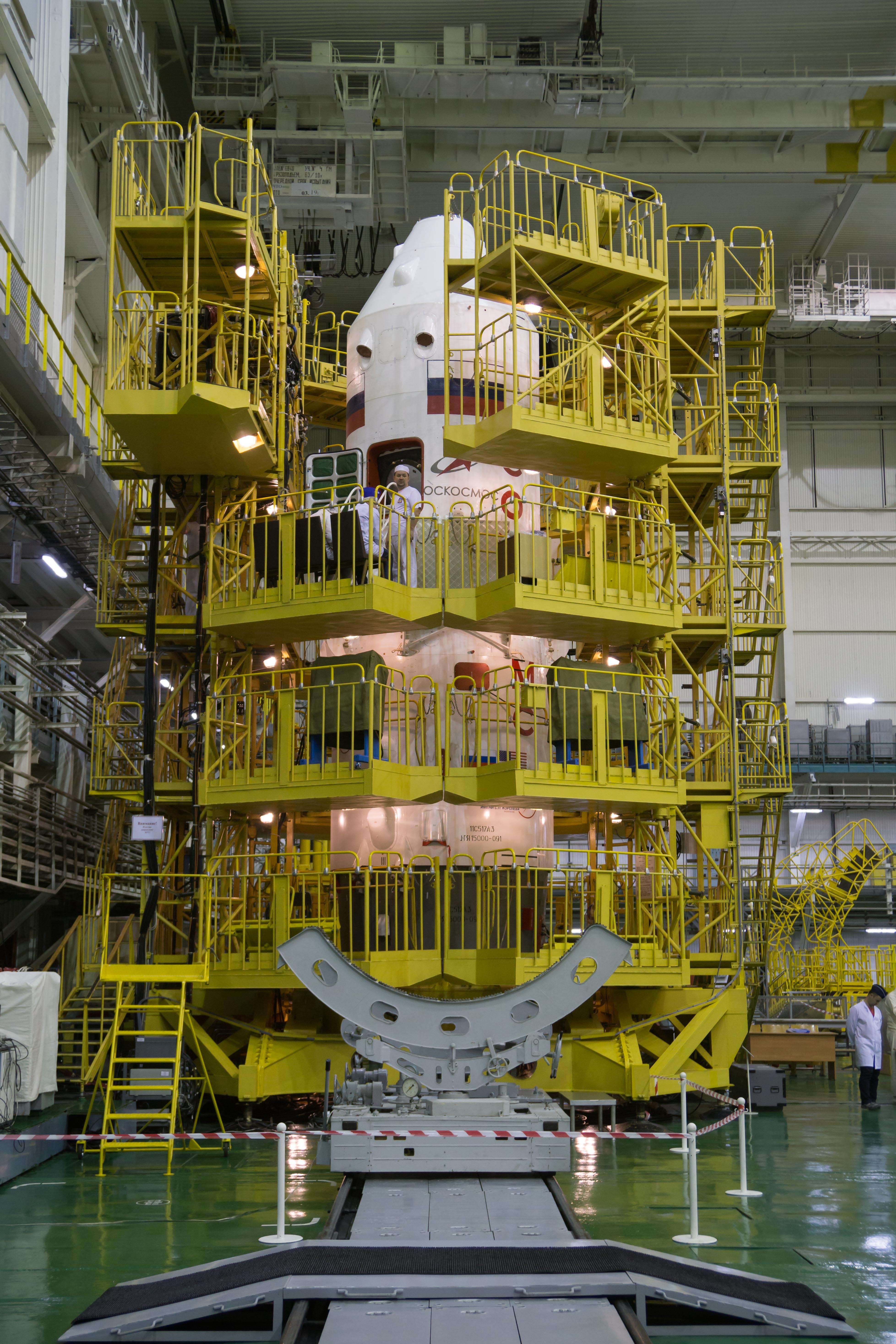 In the Integration Building at the Baikonur Cosmodrome in Kazakhstan, the Soyuz MS-12 spacecraft is surrounded by scaffolding March 10 as technicians conduct final pre-launch inspections. Expedition 59 crew members Nick Hague and Christina Koch of NASA and Alexey Ovchinin of Roscosmos will launch March 14, U.S. time, in the Soyuz MS-12 spacecraft from the Baikonur Cosmodrome for a six-and-a-half month mission on the International Space Station.