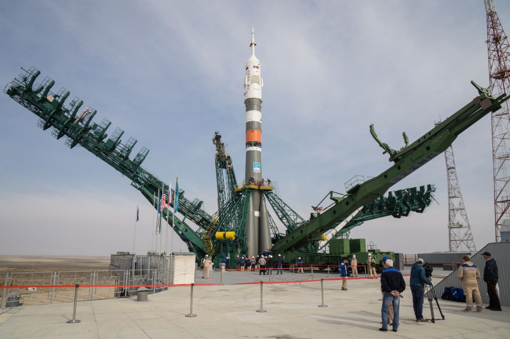 At the Baikonur Cosmodrome in Kazakhstan, the Soyuz MS-16 spacecraft and its booster stand at their vertical position at the Site 31 launch pad April 6 following rollout for final preparations for launch. Expedition 63 crewmembers Chris Cassidy of NASA and Anatoly Ivanishin and Ivan Vagner of Roscosmos are set to launch aboard the Soyuz MS-16 April 9 for a six-and-a-half month mission on the International Space Station.