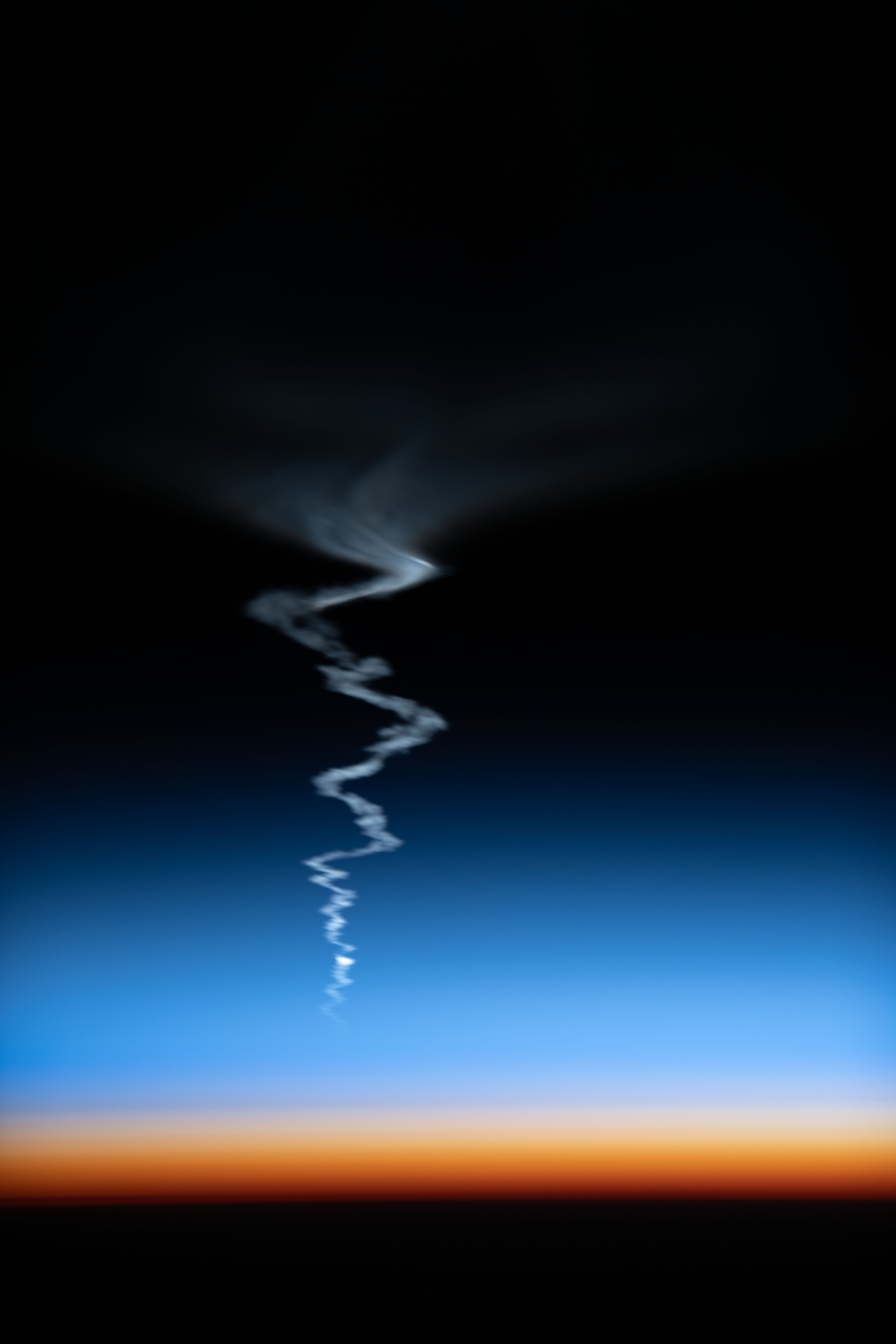 iss067e375970 (Sept. 21, 2022) --- The International Space Station was orbiting into a sunset 263 miles above Asia when this photograph of the Soyuz MS-22 crew ship ascending into space was captured by NASA astronaut and Expedition 67 Flight Engineer Bob Hines.