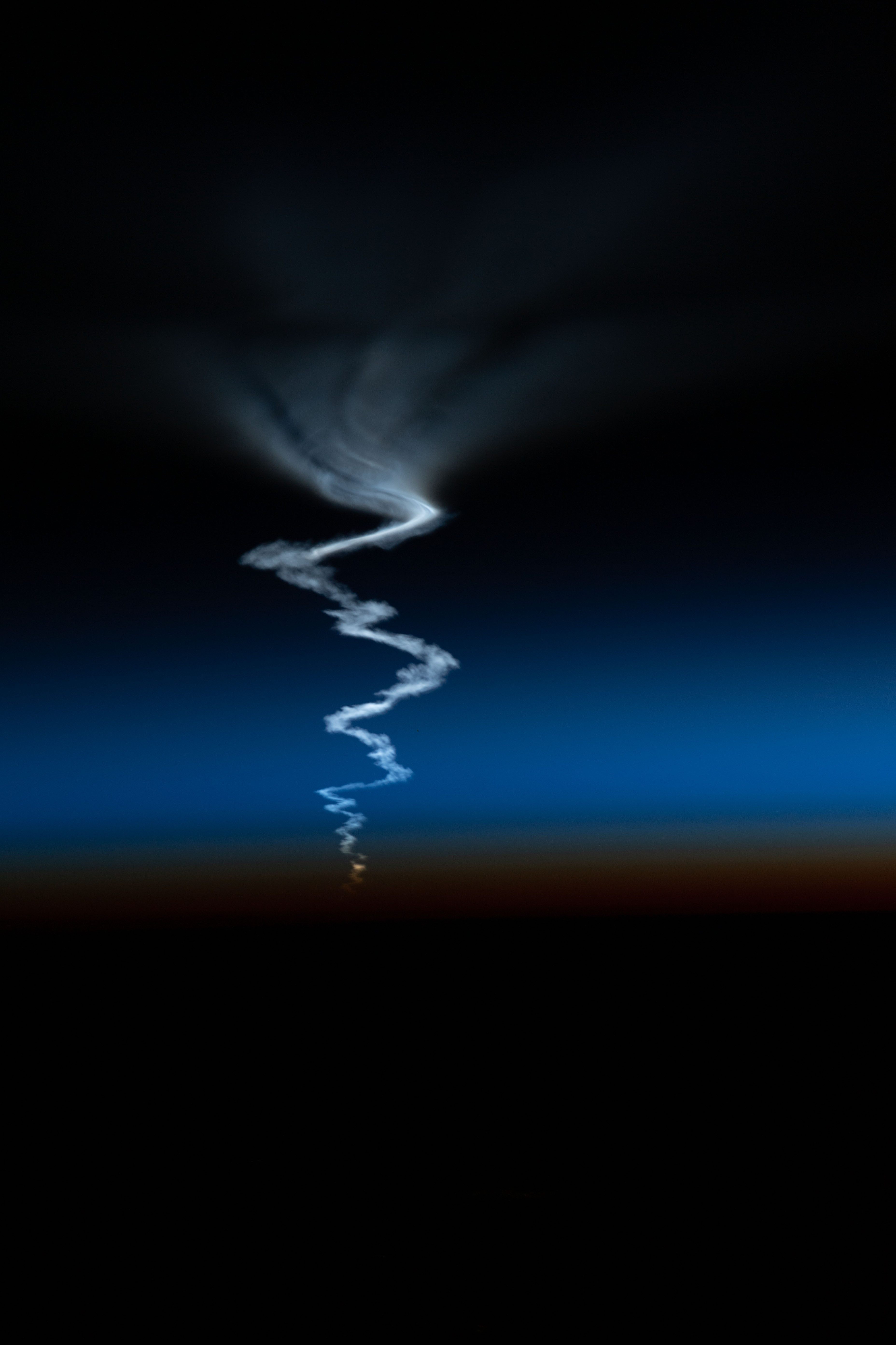 The International Space Station was orbiting into a sunset 263 miles above Asia when this photograph of the Soyuz MS-22 crew ship ascending into space was captured by NASA astronaut and Expedition 67 Flight Engineer Bob Hines.