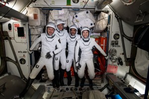 The four commercial crew astronauts representing the SpaceX Crew-3 mission are pictured in their Dragon spacesuits for a fit check aboard the International Space Station's Harmony module. From left, are ESA (European Space Agency) astronaut Matthias Maurer, and NASA astronauts Tom Marshburn, Raja Chari, and Kayla Barron.