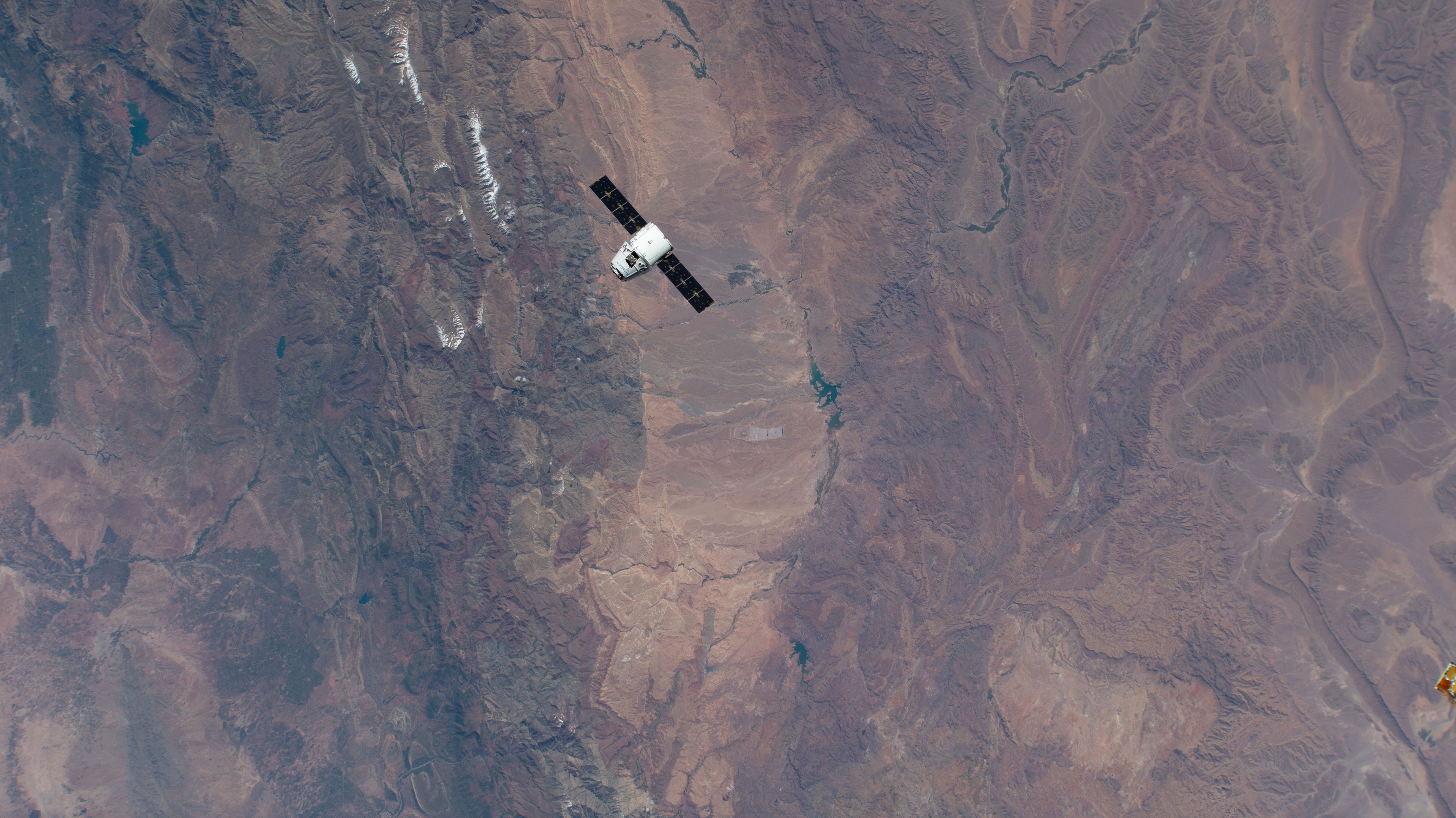 The SpaceX Dragon cargo craft approaches the International Space Station 256 miles above Morocco. Astronaut David Saint-Jacques would command the Canadarm2 robotic arm to capture Dragon as astronaut Nick Hague backed him up and monitored systems.