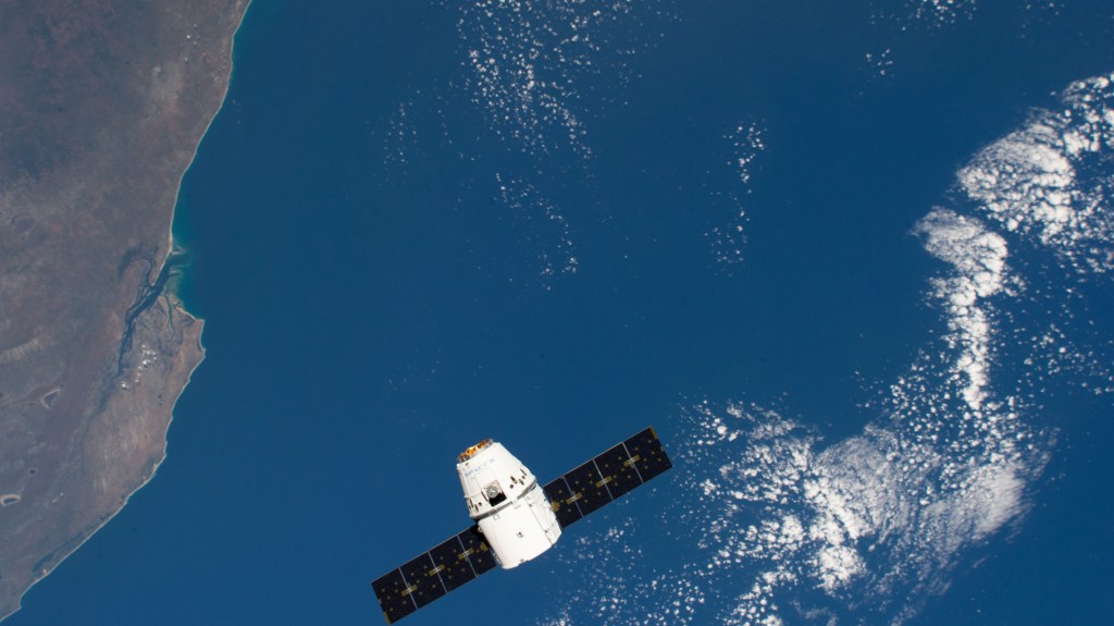 The SpaceX Dragon cargo craft approaches the International Space Station 259 miles above the coast of Mozambique. Astronaut David Saint-Jacques would command the Canadarm2 robotic arm to capture Dragon as astronaut Nick Hague backed him up and monitored systems.