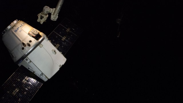 The SpaceX Dragon cargo craft on its 17th contracted mission to resupply mission to the International Space Station is pictured just after being released from the Canadarm2 robotic arm.
