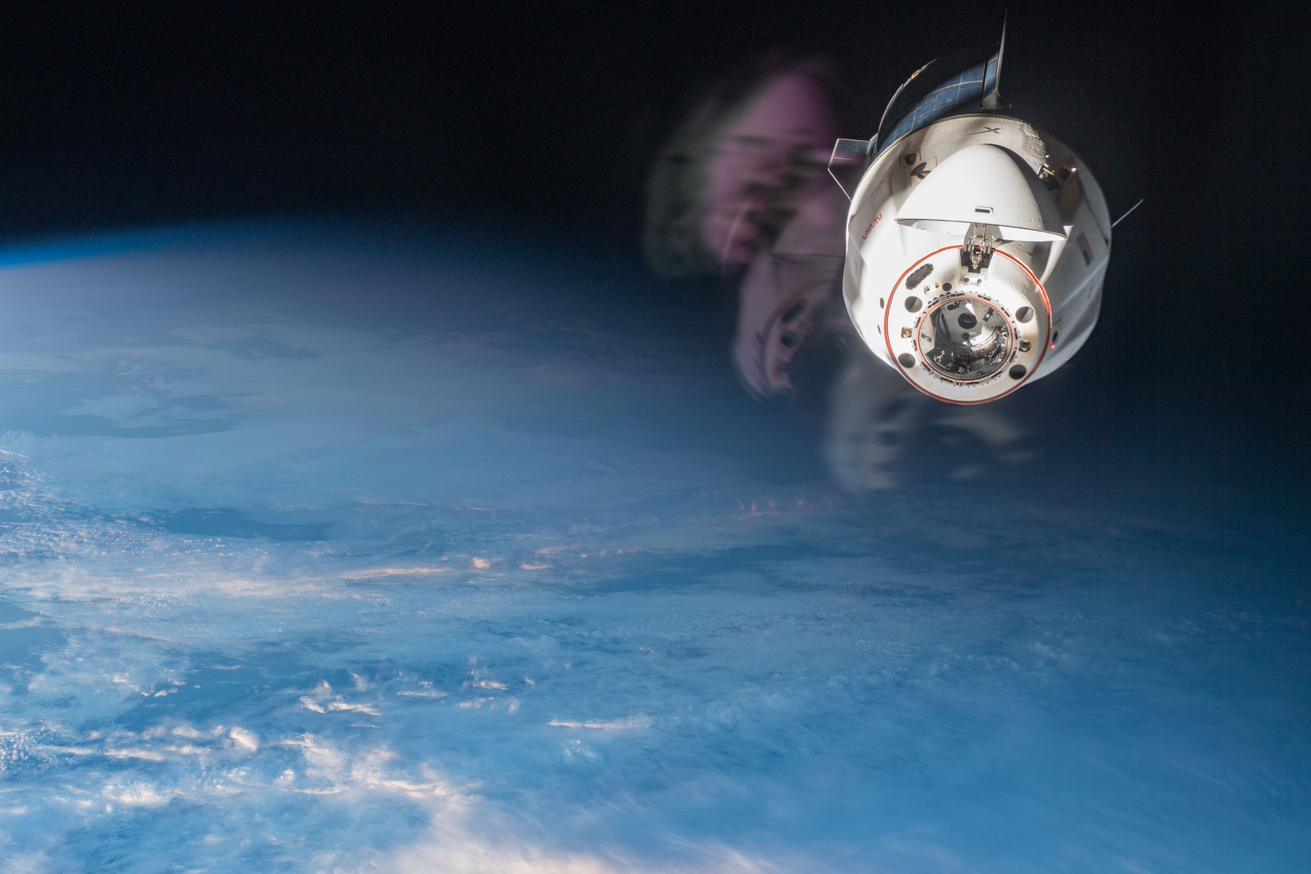 The SpaceX Dragon Endurance crew ship, carrying four Crew-3 astronauts back to Earth, is pictured from a window on the International Space Station following its undocking from the Harmony module's foward port. Crew-3 Commander Raja Chari led Pilot Tom Marshburn and Mission Specialists Kayla Barron and Matthias Maurer inside Endurance as they reentered Earth's atmosphere and parachuted to a splashdown off the coast of Tampa, Florida, the next day.