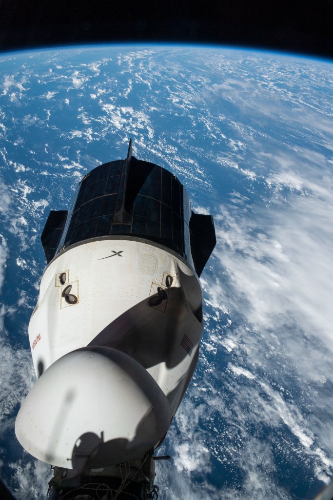 The SpaceX Dragon Endurance crew ship, with its nosecone open, is pictured docked to the Harmony module's forward port on the International Space Station. The orbiting lab was flying 269 miles above the Atlantic Ocean off the coast of Argentina at the time this photograph was taken,